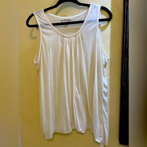 Two off white shirts